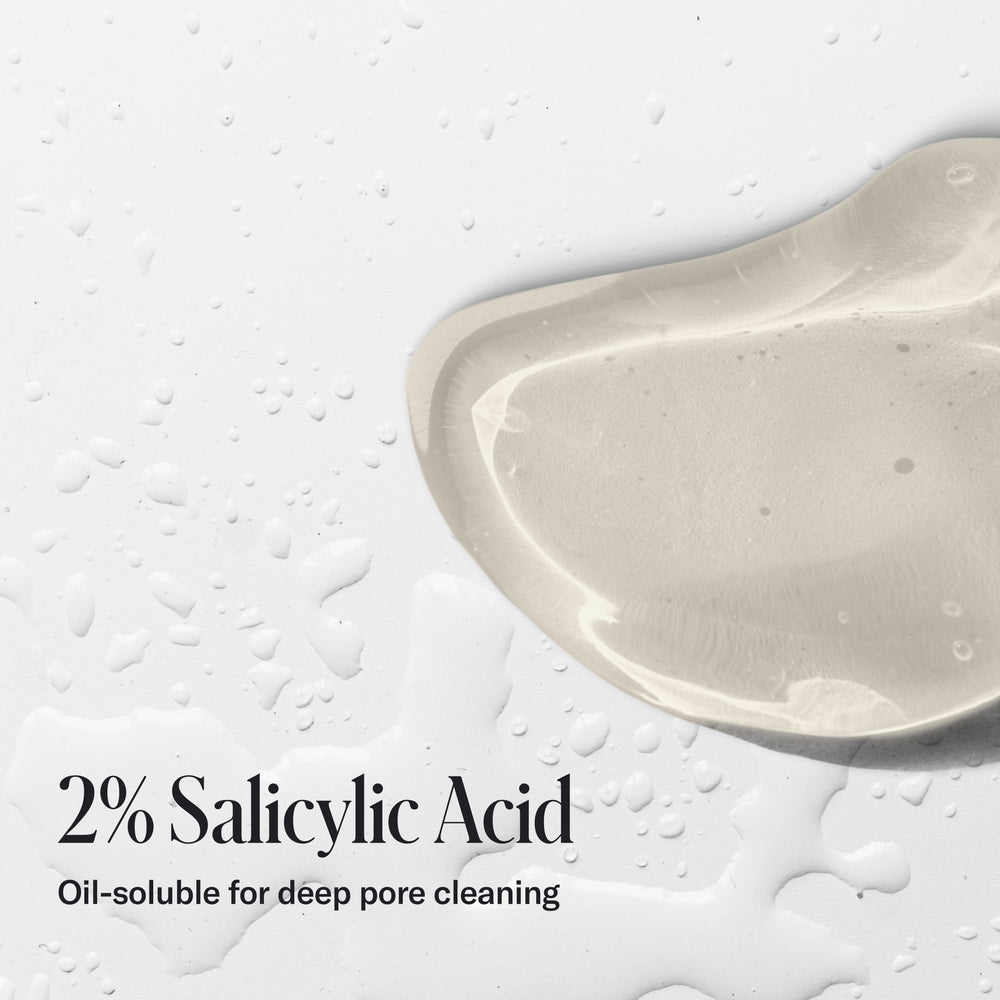 Clear gel-like substance on a white surface with water droplets. Text: 'Geologie Acne Control Face Wash—2% salicylic acid for deep pore cleaning.