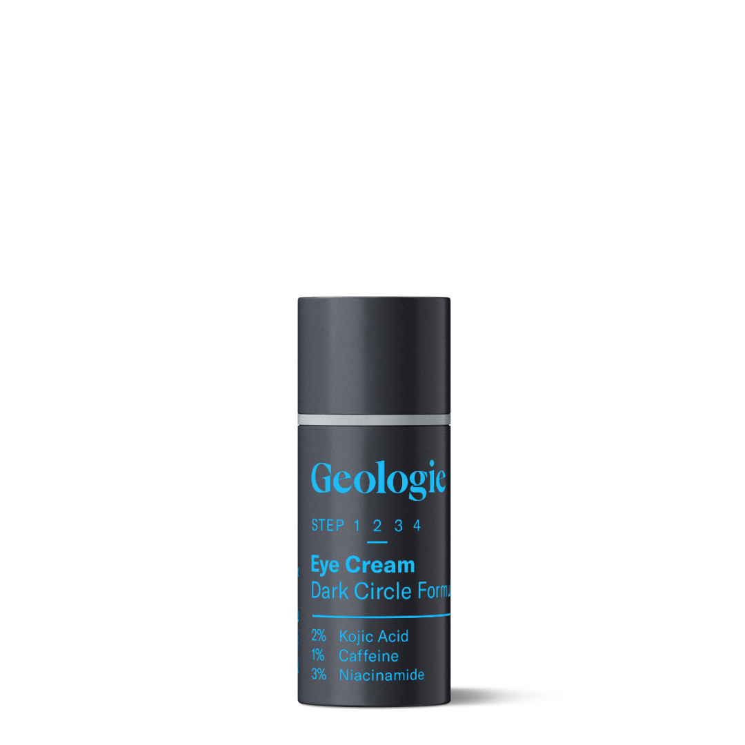 A bottle of Geologie Eye Cream - Dark Circle Formula with 2% Kojic Acid, 1% Caffeine, and 3% Niacinamide, enriched with powerful antioxidants.