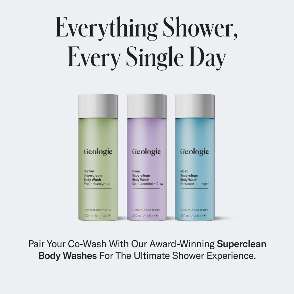 Image of three Geologie body washes in green, purple, and blue bottles, with text above them stating 'Everything Shower, Every Single Day.' Description below promotes pairing with Geologie Co-Wash Cleansing Conditioner to cleanse and condition hair for a healthier scalp.