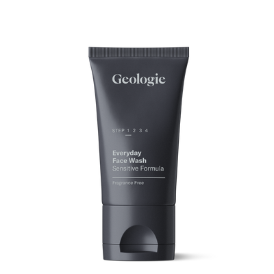 A tube of Geologie Sensitive Face Wash with a label stating it is for everyday use, suitable as a sensitive skin cleanser, and fragrance-free, against a black background.