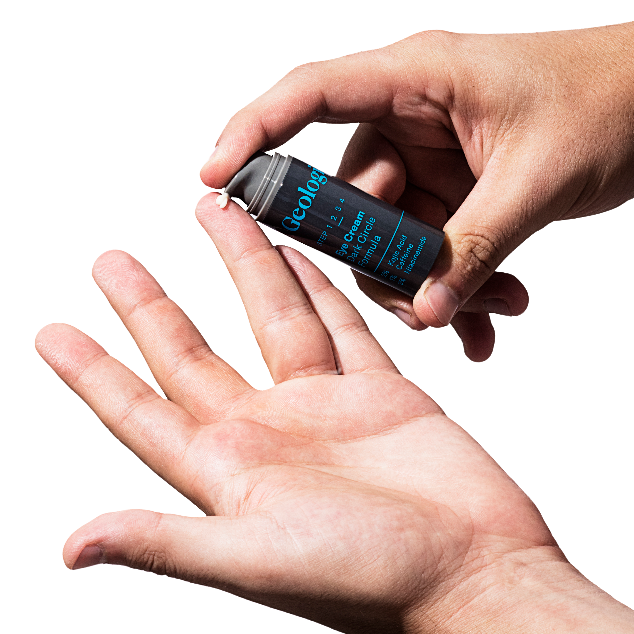 A person holding a small vial labeled 