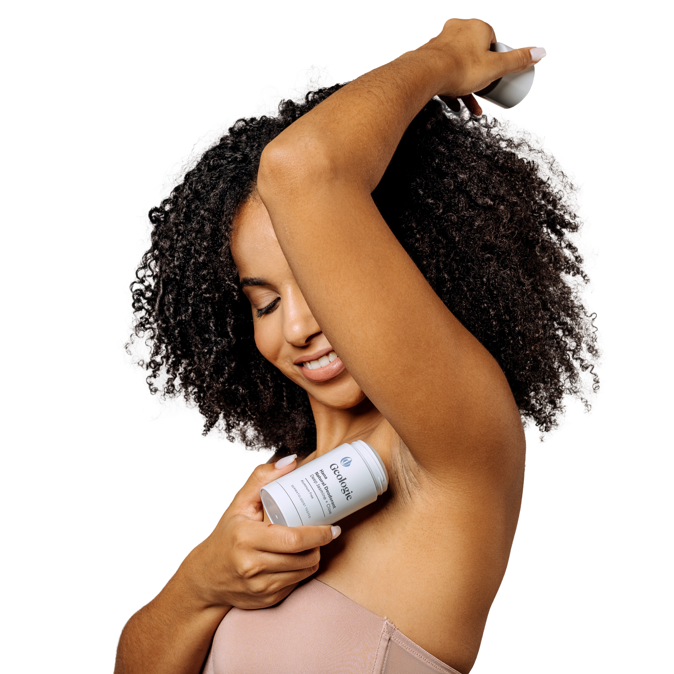 Woman applying Geologie Body Bundle on her underarm.